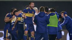 Boca Juniors players celebrate after defeating River Plate in a penalty shootout during a Copa Argentina soccer match at Ciudad de la Plata stadium in La Plata, Argentina, Wednesday, Aug. 4, 2021. (Demian Alday/Pool via AP)