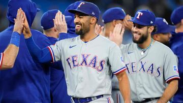 TORONTO, ON - SEPTEMBER 14: Marcus Semien (C) #2 of the Texas Rangers celebrates with teammates after defeating the Toronto Blue Jays at Rogers Centre on September 14, 2023 in Toronto, Canada.   Mark Blinch/Getty Images/AFP (Photo by MARK BLINCH / GETTY IMAGES NORTH AMERICA / Getty Images via AFP)