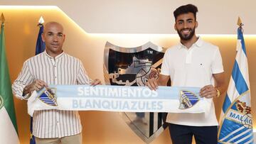 Manolo Gaspar y Juande posan juntos en La Rosaleda.