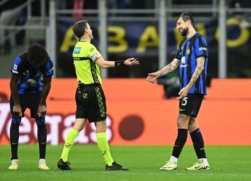 San Siro, Milan, Italy - March 17, 2024 Inter Milan's Francesco Acerbi and referee Federico La Penna after the match 