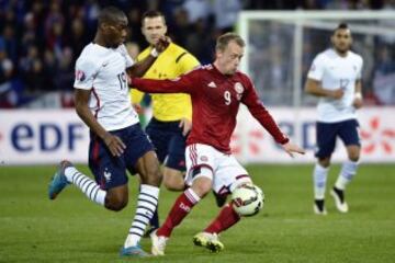 Geoffrey Kondogbia y Michael Krohn-Dehli.