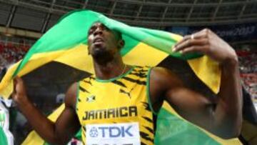 Bolt, en la celebraci&oacute;n de su t&iacute;tulo en los 100 metros.