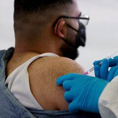 OMS llama a seguir usando cubrebocas