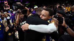 LOS ANGELES, CALIFORNIA - MAY 12: Stephen Curry #30 of the Golden State Warriors hugs LeBron James #6 of the Los Angeles Lakers after the Western Conference Semifinal Playoff game at Crypto.com Arena on May 12, 2023 in Los Angeles, California. Lakers eliminated the Warriors, 122-101. NOTE TO USER: User expressly acknowledges and agrees that, by downloading and or using this photograph, User is consenting to the terms and conditions of the Getty Images License Agreement.   Kevork Djansezian/Getty Images/AFP (Photo by KEVORK DJANSEZIAN / GETTY IMAGES NORTH AMERICA / Getty Images via AFP)