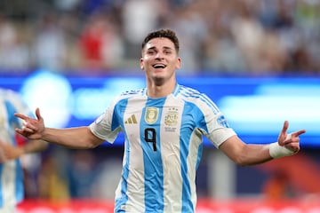 Argentina's forward #09 Julian Alvarez celebrates scoring his team's first goal during the Conmebol 2024 Copa America tournament semi-final football match between Argentina and Canada at MetLife Stadium, in East Rutherford, New Jersey on July 9, 2024. (Photo by CHARLY TRIBALLEAU / AFP)