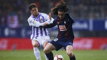 Eibar, northern Spain, Sunday, March, 17, 2019. Marc Cucurella Sergio Gontan competes for the ball during the Spanish La Liga soccer match between S.D Eibar and Real Valladolid C.F at Ipurua stadium.