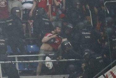 Police and Bayern Munich fans clash in the Bernabéu