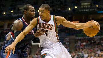 Milwaukee Bucks guard Giannis Antetokounmpo (34) backs down on Atlanta Hawks forward Paul Millsap (4) during the first quarter at BMO Harris Bradley Center.