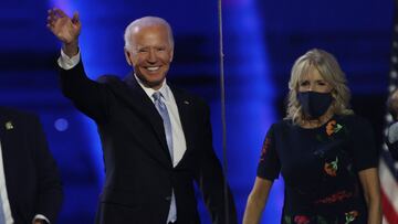 WILMINGTON, DELAWARE - NOVEMBER 07: President-elect Joe Biden and Jill Biden wave to the crowd after Biden&#039;s address to the nation from the Chase Center November 07, 2020 in Wilmington, Delaware. After four days of counting the high volume of mail-in