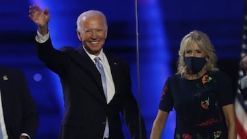 WILMINGTON, DELAWARE - NOVEMBER 07: President-elect Joe Biden and Jill Biden wave to the crowd after Biden&#039;s address to the nation from the Chase Center November 07, 2020 in Wilmington, Delaware. After four days of counting the high volume of mail-in