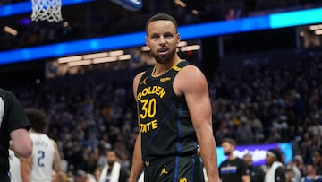 Nov 12, 2024; San Francisco, California, USA; Golden State Warriors guard Stephen Curry (30) reacts after making a layup against the Dallas Mavericks in the fourth quarter at the Chase Center. Mandatory Credit: Cary Edmondson-Imagn Images