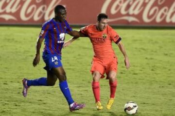 Simao con Lionel Messi.