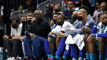 Michael Jordan on the bench with the Charlotte Hornets squad.