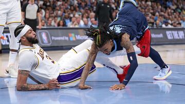 MEMPHIS, TENNESSEE - APRIL 16: Ja Morant #12 of the Memphis Grizzlies injures his hand during the second half against the Los Angeles Lakers during Game One of the Western Conference First Round Playoffs at FedExForum on April 16, 2023 in Memphis, Tennessee. NOTE TO USER: User expressly acknowledges and agrees that, by downloading and or using this photograph, User is consenting to the terms and conditions of the Getty Images License Agreement.   Justin Ford/Getty Images/AFP (Photo by Justin Ford / GETTY IMAGES NORTH AMERICA / Getty Images via AFP)