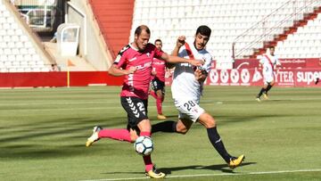 Berrocal, junto a Zozulya. 