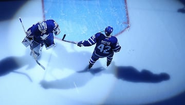 Frederik Andersen #31 and Tyler Bozak #42 of the Toronto Maple Leafs skate prior to action against the Washington Capitals 