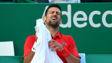 Tennis - ATP Masters 1000 - Monte Carlo Masters - Monte Carlo Country Club, Roquebrune-Cap-Martin, France - April 13, 2024 Serbia's Novak Djokovic reacts during a break in play on his semi final match against Norway's Casper Ruud REUTERS/Denis Balibouse