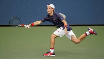 Diego Schwartzman, of Argentina, returns a shot to Cameron Norrie, of Great Britain, during the first round of the US Open tennis championships, Monday, Aug. 31, 2020, in New York. (AP Photo/Frank Franklin II)