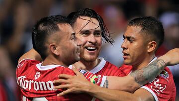 Aug 1, 2024; Bridgeview, Illinois, USA; Toluca midfielder Jesus Ricardo Angulo Uriarte (10) celebrates with teammates after scoring during the first half of a match against the Chicago Fire FC at SeatGeek Stadium. Mandatory Credit: Melissa Tamez-USA TODAY Sports