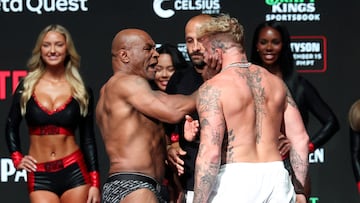 Nov 14, 2024; Irving, TX, USA; Mike Tyson slaps Jake Paul after weighing in at the Toyota Music Factory. Mandatory Credit: Kevin Jairaj-Imagn Images TPX IMAGES OF THE DAY