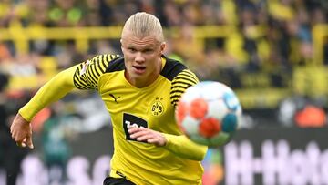 Dortmund's Norwegian forward Erling Braut Haaland vies for the ball during the German first division Bundesliga football match BVB Borussia Dortmund v Mainz 05 in Dortmund, western Germany, on October 16, 2021. (Photo by Ina Fassbender / AFP) / DFL R
