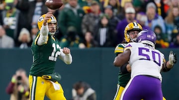 Jan 1, 2023; Green Bay, Wisconsin, USA; Green Bay Packers quarterback Aaron Rodgers (12) passes the ball against the Minnesota Vikings during their game at Lambeau Field. Mandatory Credit: Tork Mason-USA TODAY Sports