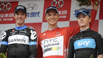 Tony Martin posa junto a  Chris Froome y David Millar en el podio del Tour de Pek&iacute;n de 2011.