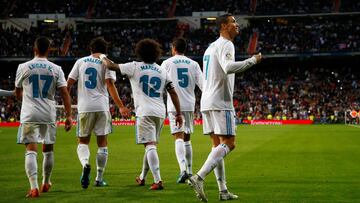 Soccer Football - La Liga Santander - Real Madrid vs Malaga - Santiago Bernabeu, Madrid, Spain - November 25, 2017  Real Madrid&rsquo;s Cristiano Ronaldo celebrates scoring their third goal with team mates  REUTERS/Javier Barbancho