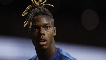 Athletic Bilbao's Spanish forward #11 Nico Williams reacts to alleged racist insults from the public during the Spanish league football match between Club Atletico de Madrid and Athletic Club Bilbao at the Metropolitano stadium in Madrid on April 27, 2024. (Photo by OSCAR DEL POZO / AFP)