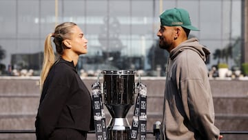 Tennis - 'Battle of the Sexes' - Nick Kyrgios v Aryna Sabalenka - Press Conference - Coca-Cola Arena, Dubai, United Arab Emirates - December 27, 2025 Nick Kyrgios and Aryna Sabalenka face-off with the trophy during the press conference REUTERS/Amr Alfiky TPX IMAGES OF THE DAY