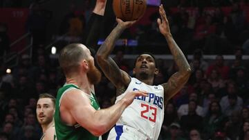 March 11, 2019; Los Angeles, CA, USA; Los Angeles Clippers guard Lou Williams (23) shoots against Boston Celtics center Aron Baynes (46) during the first half at Staples Center. Mandatory Credit: Richard Mackson-USA TODAY Sports