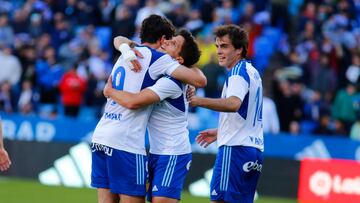 Azón, Giuliano y Francho celebran uno de los goles del Zaragoza contra el Racing.