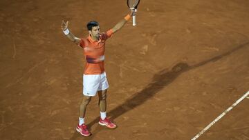 Novak Djokovic of Serbia celebrates after winning a point to Felix Auger-Aliassime of Canada during their match at the Italian Open tennis tournament, in Rome, Friday, May 13, 2022. (AP Photo/Andrew Medichini)