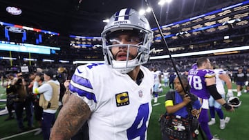 ARLINGTON, TEXAS - DECEMBER 14: Dak Prescott #4 of the Dallas Cowboys reacts after his team was defeated by the Minnesota Vikings at AT&T Stadium on December 14, 2025 in Arlington, Texas. Sam Hodde/Getty Images/AFP (Photo by Sam Hodde / GETTY IMAGES NORTH AMERICA / Getty Images via AFP)