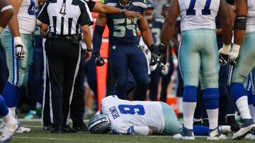 SEATTLE, WA - AUGUST 25: Quarterback Tony Romo #9 of the Dallas Cowboys lies on the turf after being injured in the first quarter during a preseason game against the Seattle Seahawks at CenturyLink Field on August 25, 2016 in Seattle, Washington.   Otto Greule Jr/Getty Images/AFP
 == FOR NEWSPAPERS, INTERNET, TELCOS &amp; TELEVISION USE ONLY ==