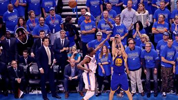 Golden State Warriors guard Klay Thompson (11) scores over Oklahoma City Thunder forward Kevin Durant (35) during the fourth quarter in game six of the Western conference finals of the NBA Playoffs at Chesapeake Energy Arena.