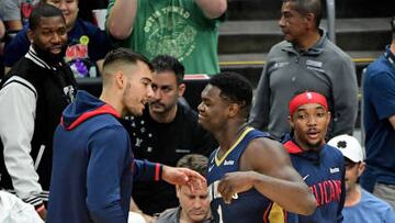 Willy Hernangomez #9 and Zion Williamson #1 of the New Orleans Pelicans high five before the game against the LA Clippers on October 30, 2022 at Crypto.Com Arena in Los Angeles, California.