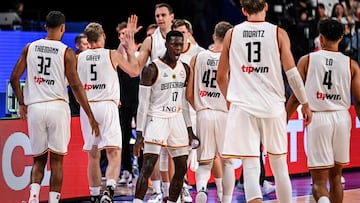 Germany's Dennis Schroder (C) reacts during the FIBA Basketball World Cup group K match between Germany and Slovenia at Okinawa Arena in Okinawa on September 3, 2023. (Photo by Yuichi YAMAZAKI / AFP)