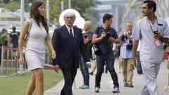 Ecclestone con su esposa Fabiana Flosi en Singapur.