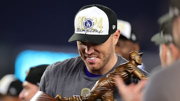 NEW YORK, NEW YORK - OCTOBER 30: Freddie Freeman #5 of the Los Angeles Dodgers is presented with the MVP trophy after the Dodgers defeated the New York Yankees 7-6 in game 5 to win the 2024 World Series at Yankee Stadium on October 30, 2024 in the Bronx borough of New York City. Alex Slitz/Getty Images/AFP (Photo by Alex Slitz / GETTY IMAGES NORTH AMERICA / Getty Images via AFP)