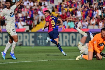 Barcelona's Polish forward #09 Robert Lewandowski celebrates scoring his team's second goal during the Spanish league football match between FC Barcelona and Real Valladolid FC at the Estadi Olimpic Lluis Companys in Barcelona on August 31, 2024. (Photo by MANU QUINTERO / AFP)