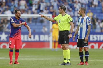 Koke, Mart¨ªnez Munuera y Sergi Darder