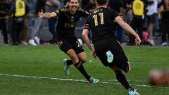 Nov 5, 2022; Los Angeles, California, US; Los Angeles FC forward Gareth Bale (11) celebrates with Los Angeles FC midfielder Ryan Hollingshead (24) after scoring a goal in overtime against Philadelphia Union at Banc of California Stadium. Mandatory Credit: Kelvin Kuo-USA TODAY Sports