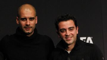 Xavi con Guardiola.