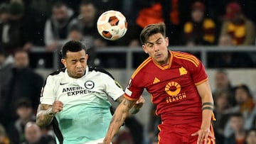 Soccer Football - Europa League - Round of 16 - First Leg - AS Roma v Brighton & Hove Albion - Stadio Olimpico, Rome, Italy - March 7, 2024 Brighton & Hove Albion's Igor Julio in action with AS Roma's Paulo Dybala REUTERS/Alberto Lingria