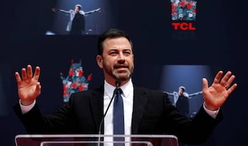 FILE PHOTO: Television host Jimmy Kimmel speaks at a ceremony for recording artist Lionel Richie to place his handprints and footprints in cement in the forecourt of the TCL Chinese theatre in Los Angeles, California, U.S., March 7, 2018. REUTERS/Mario An