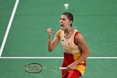 Spain's Carolina Marin celebrates winning against US' Beiwen Zhang in their women's singles badminton round of 16 match during the Paris 2024 Olympic Games at Porte de la Chapelle Arena in Paris on August 1, 2024. (Photo by ARUN SANKAR / AFP)