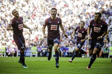 Fran Rico (second left) celebrates after putting Eibar ahead at the Bernaéu.