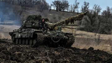 Ukrainian servicemen ride atop of a tank at a position near a frontline, amid Russia's attack on Ukraine, in Zaporizhzhia region, Ukraine March 16, 2023. REUTERS/Stringer