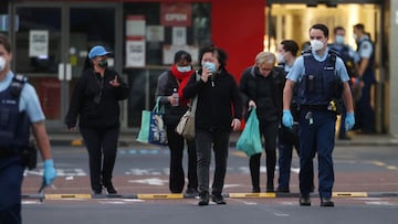 AUCKLAND, NEW ZEALAND - SEPTEMBER 03: Police escort people from LynnMall to their cars after a violent extremist took out a terrorist attack stabbing six people before being shot by police on September 03, 2021 in Auckland, New Zealand. A man has been kil